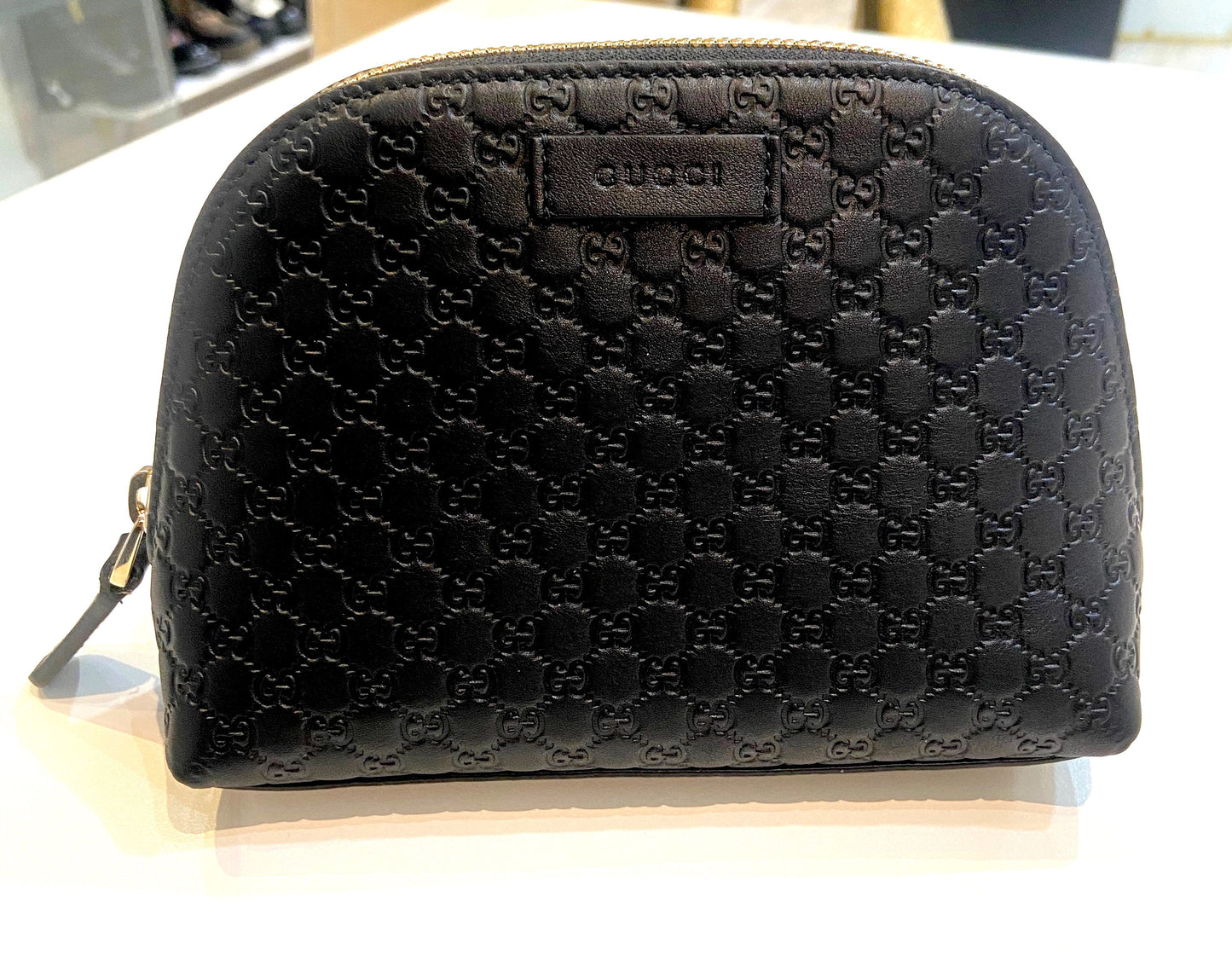 GUCCI GG MICROGUCCISSIMA LEATHER COSMETIC POUCH