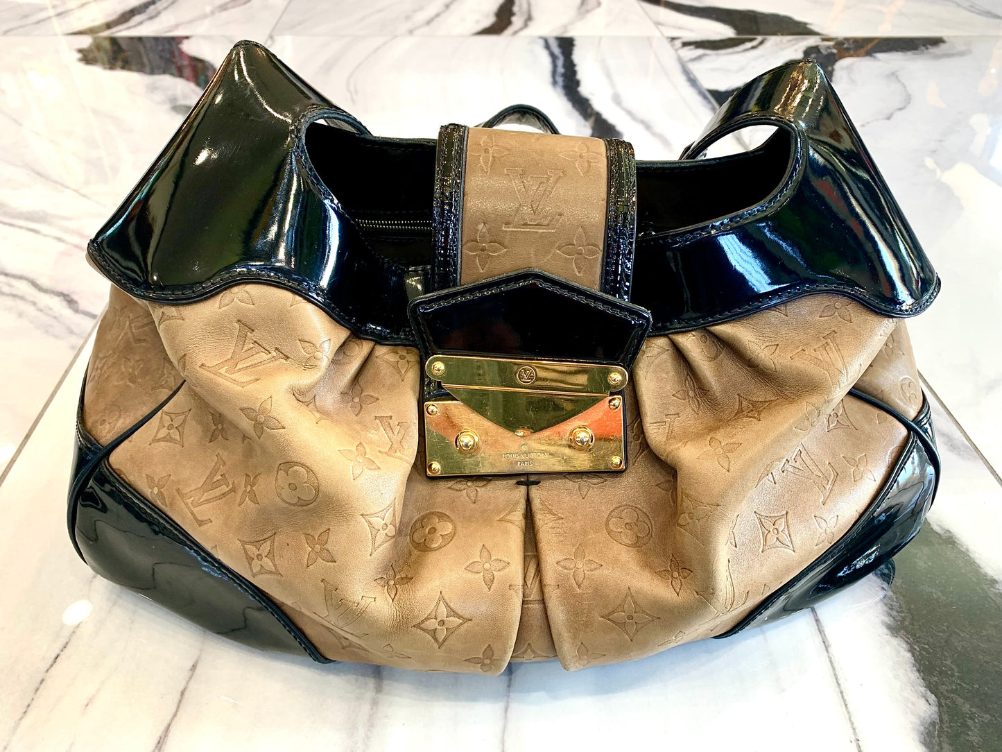 LOUIS VUITTON EMBOSSED POLLY HOBO BAG