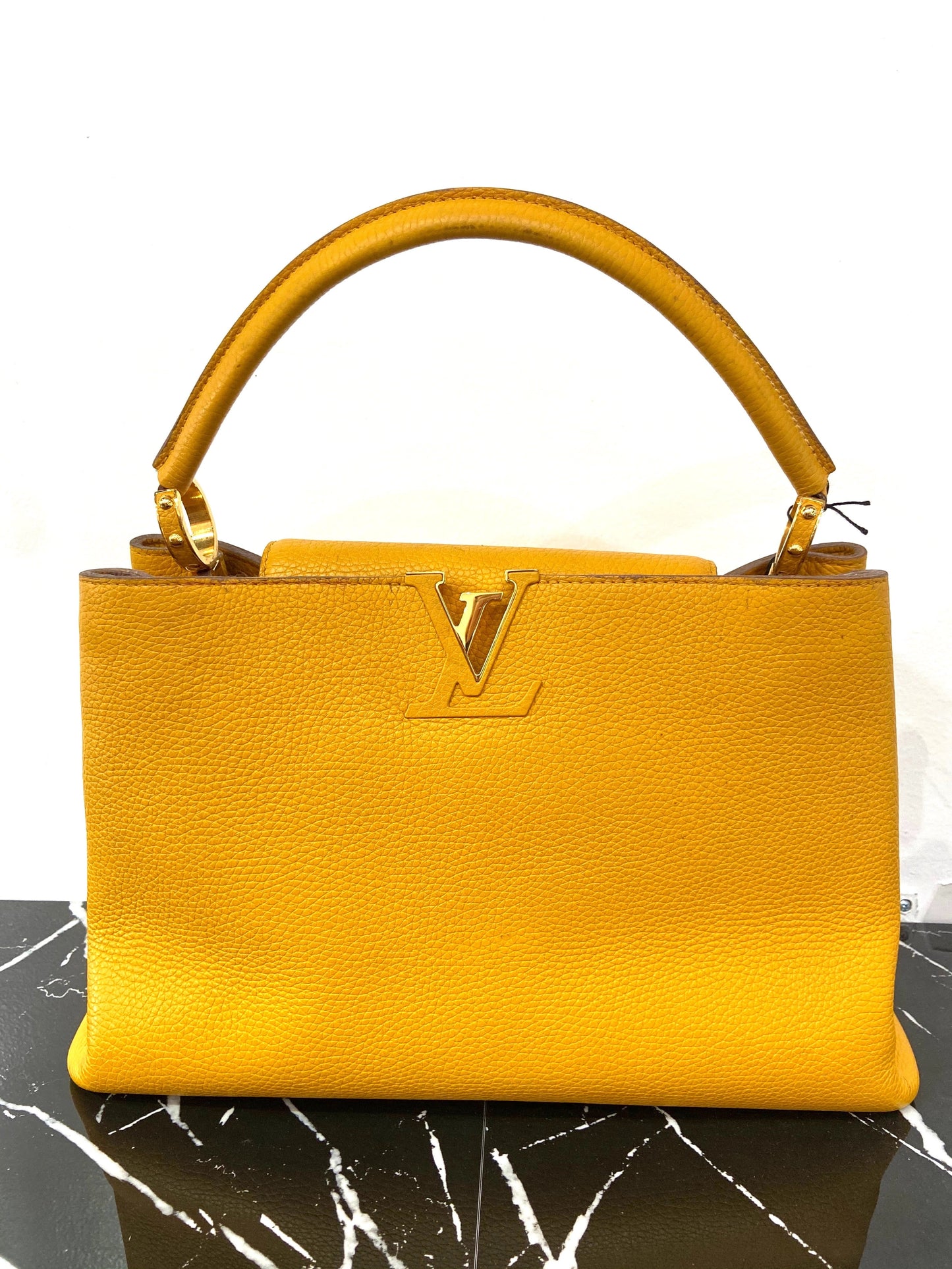 LOUIS VUITTON TAURILLON CAPUCINES MM HANDBAG TOURENESOL