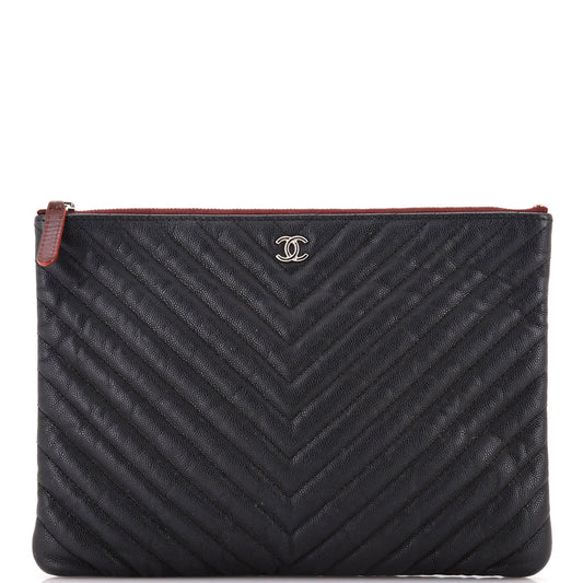 O Case Clutch Chevron Caviar Medium