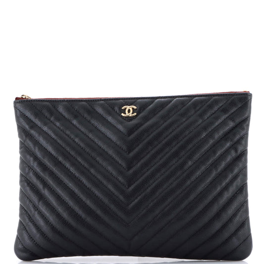 O Case Clutch Chevron Caviar Medium