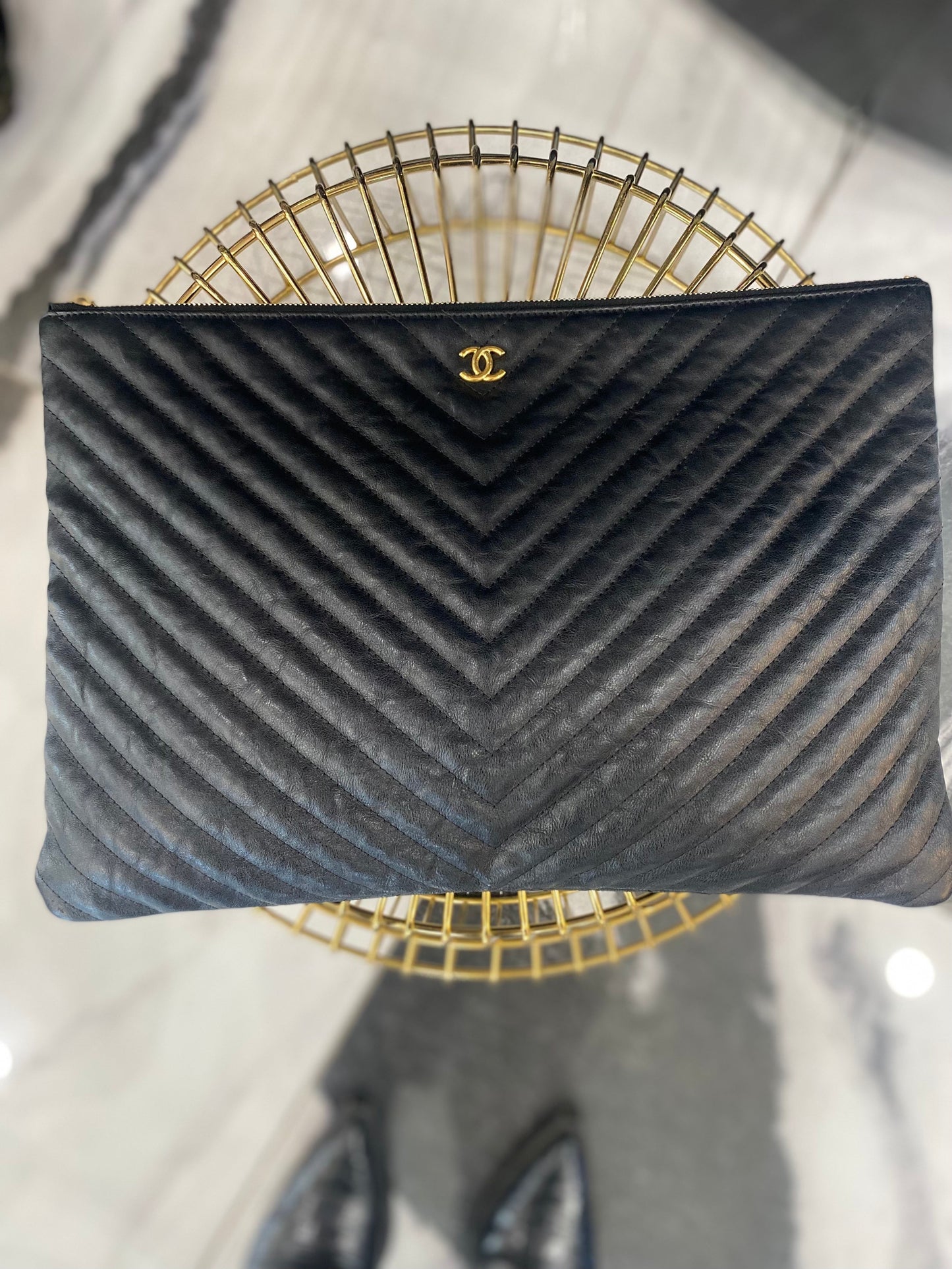 CHANEL CHEVRON QUILTED CALFSKIN O CLUTCH BAG