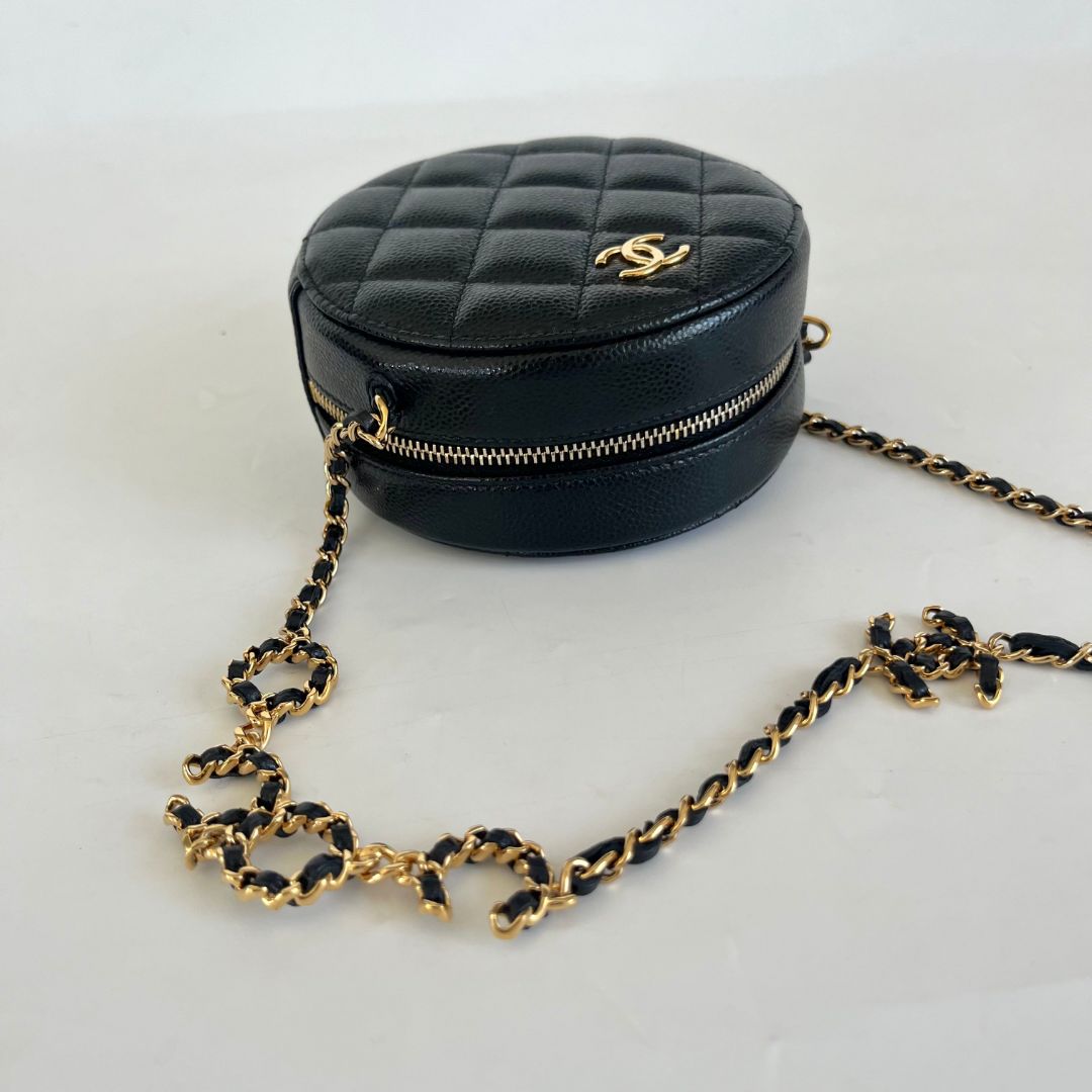 Chanel black caviar round bag