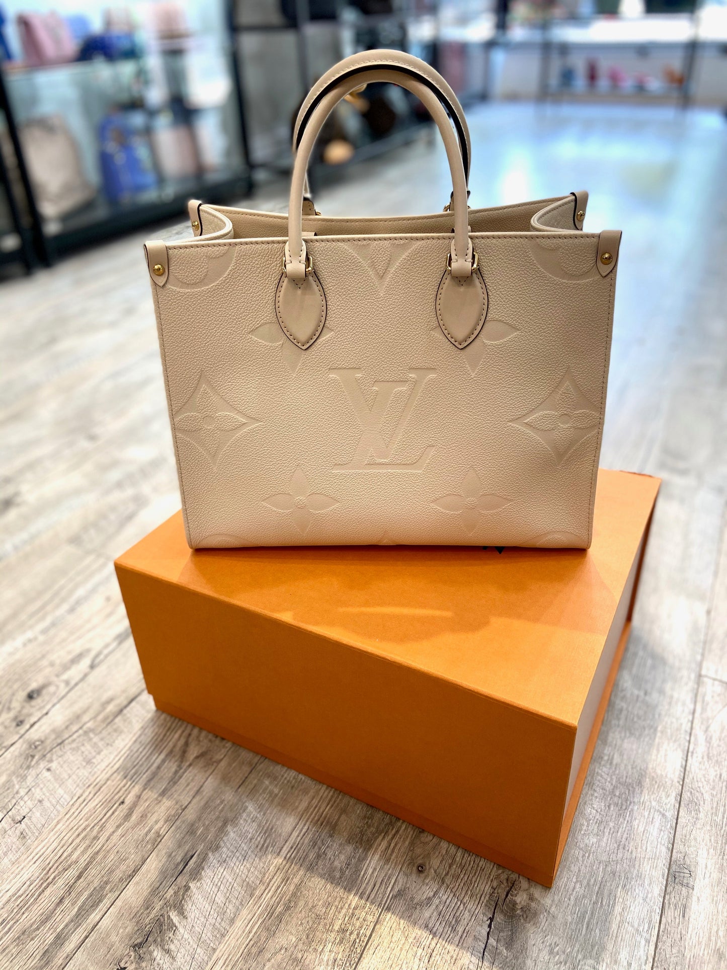 LOUIS VUITTON EMPREINTE LEATHER GIANT MONOGRAM ONTHEGO TOTE BAG